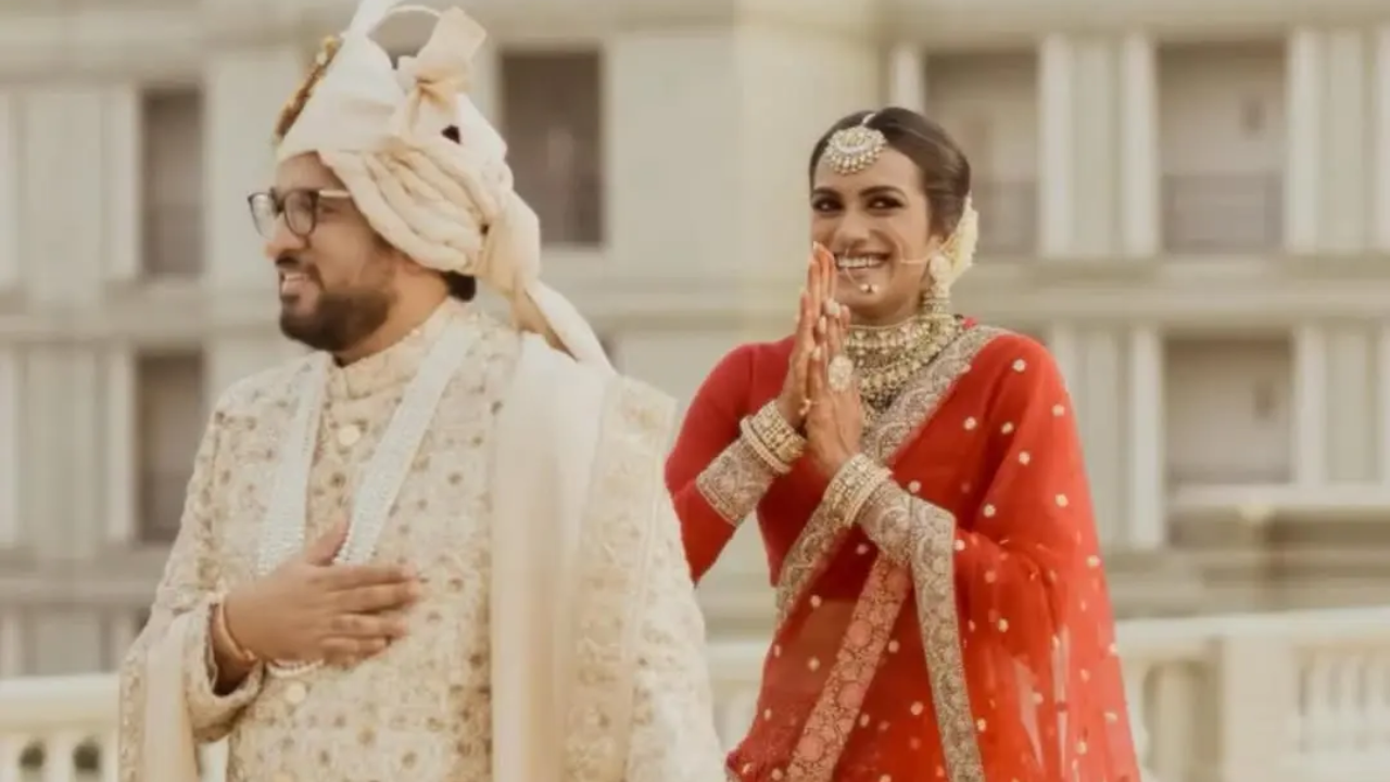 PV Sindhu in red bridal ensemble