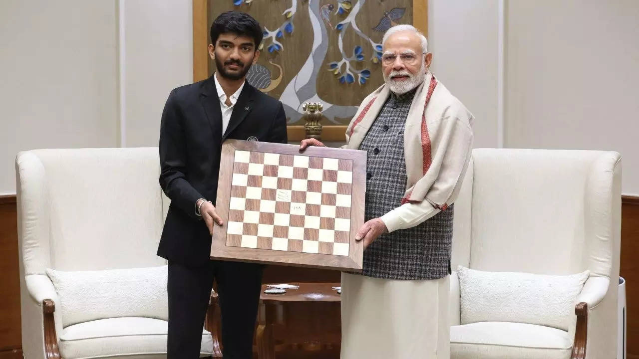 PM Modi meets D Gukesh, receives title-winning chessboard from champion