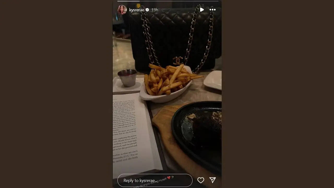 Kysre Gondrezick shows off her expensive handbag