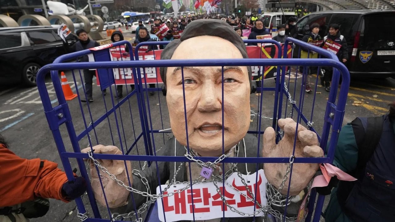 South Korean authorities seek warrant to detain impeached President Yoon in martial law probe