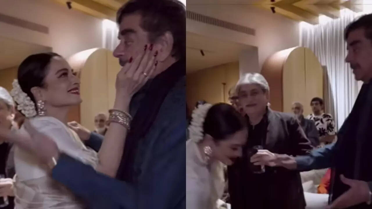 Rekha touches Shatrughan's feet on his 79th b'day