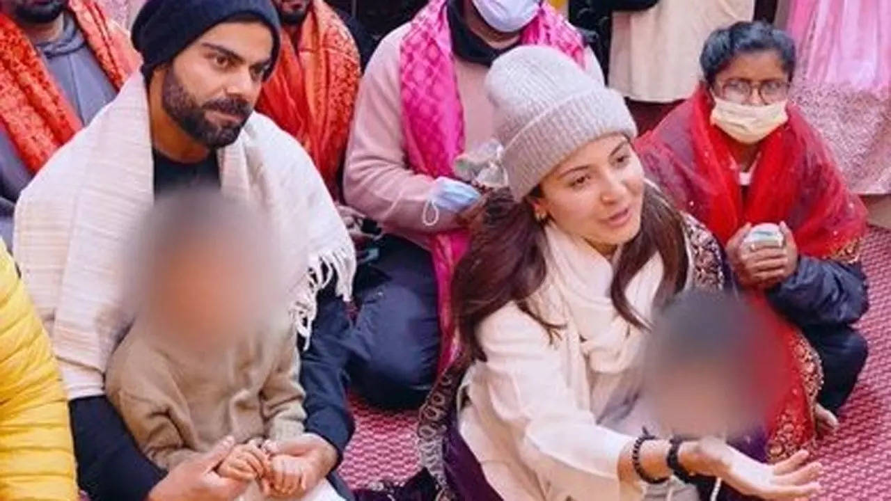 Kohli, Anushka visit Premanand Ji Maharaj with kids. Watch