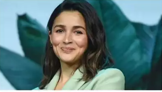 Alia attempts at curating an 'effortless' beach pic