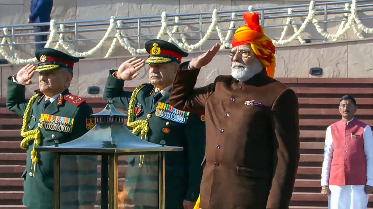 76th Republic Day: PM Modi dons yellow-red striped ‘safa’ and brown jacket