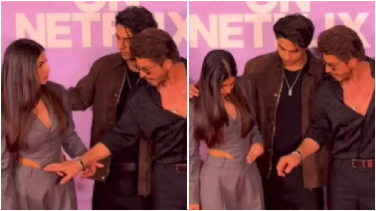SRK fixes daughter Suhana Khan's dress at event
