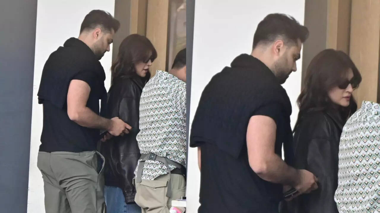 Kriti twins in black with rumoured bf Kabir at airport