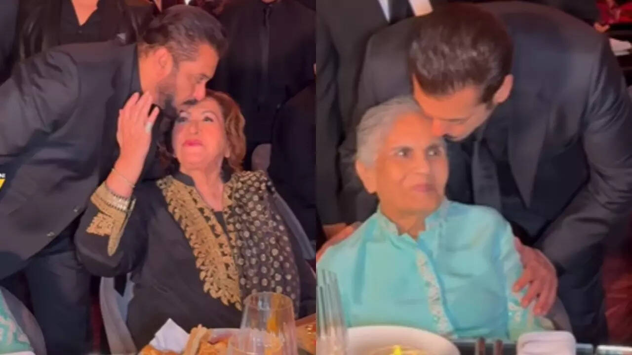 Salman kisses both his moms when he arrives at an event
