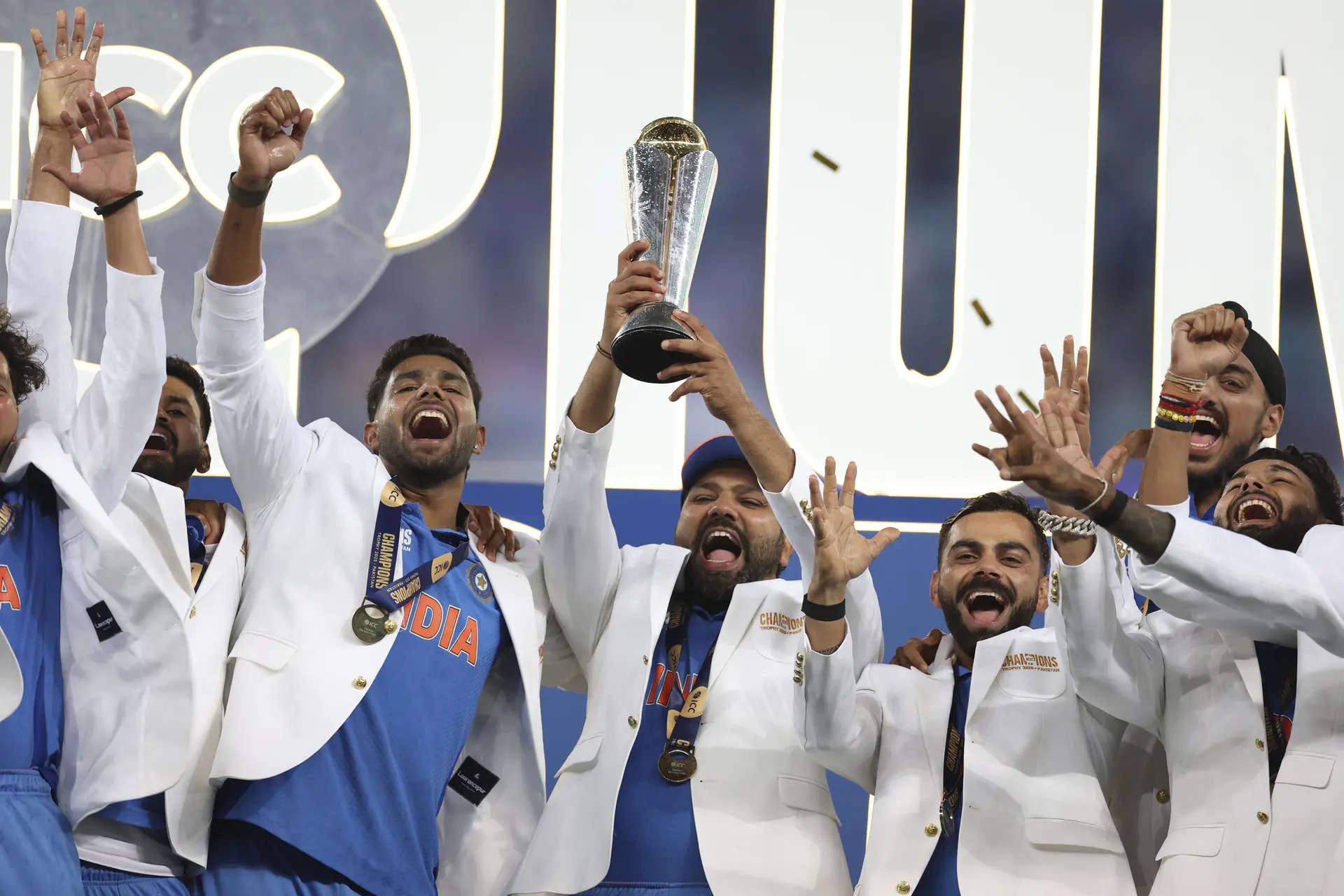 Why do Champions Trophy winners wear white jackets?