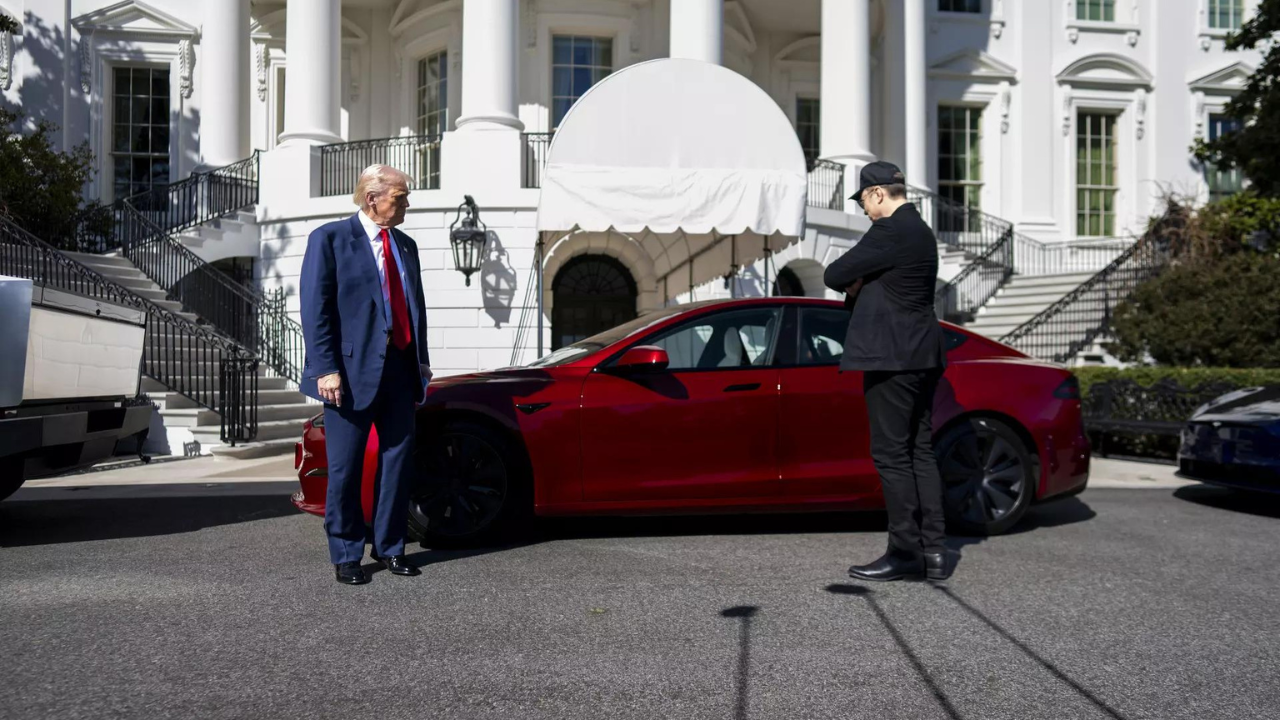 Watch: Donald Trump buys red Tesla Model S from Elon Musk, says he wants no discount