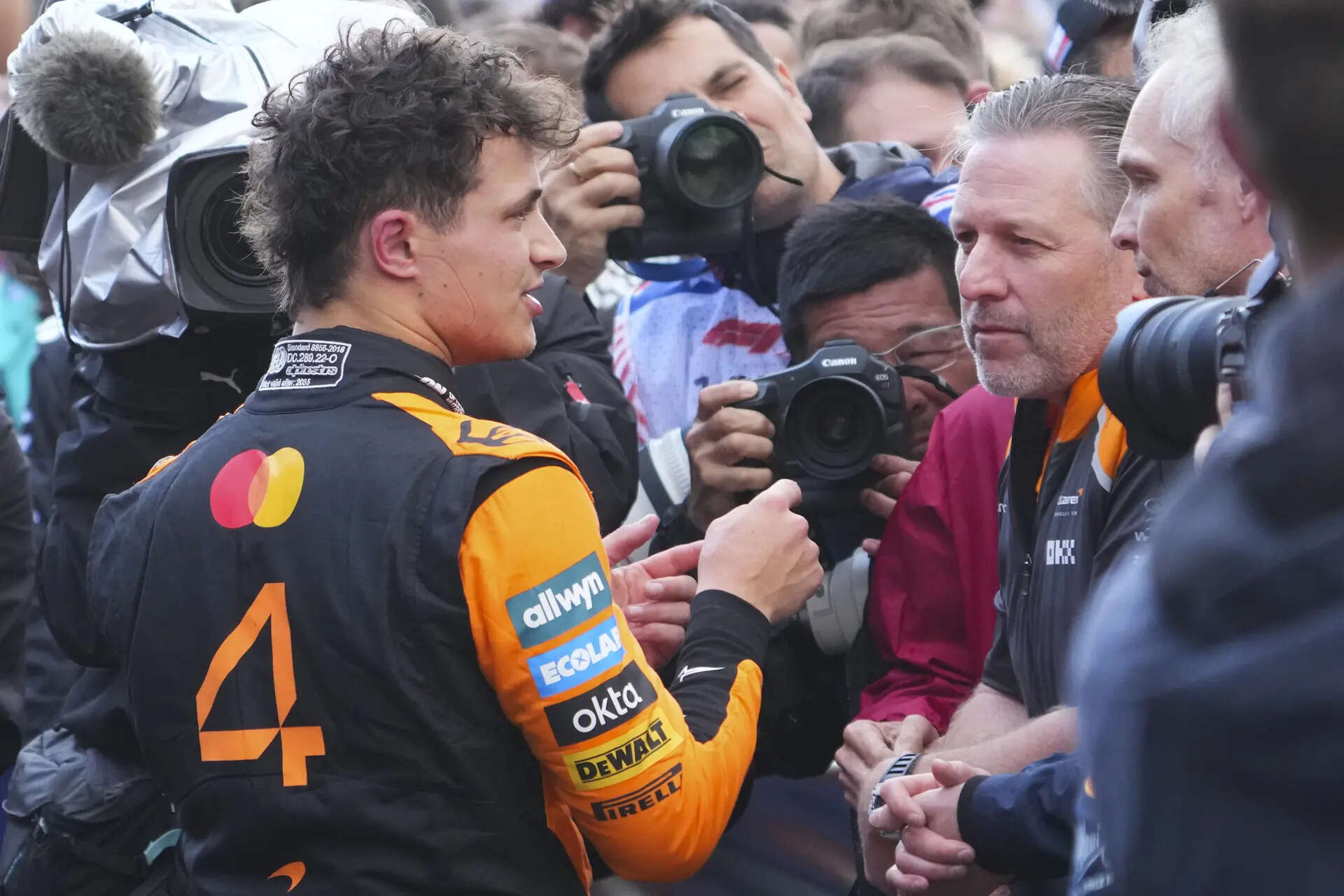 Australian GP: Norris wins rain-affected race