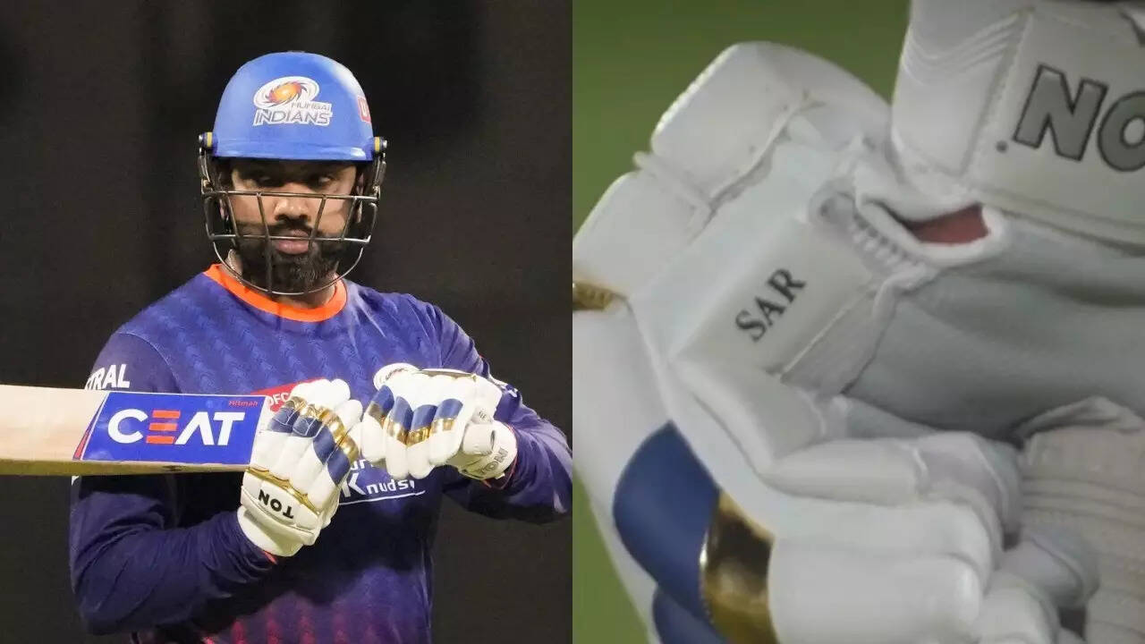 What does 'SAR' on Rohit Sharma's gloves mean?