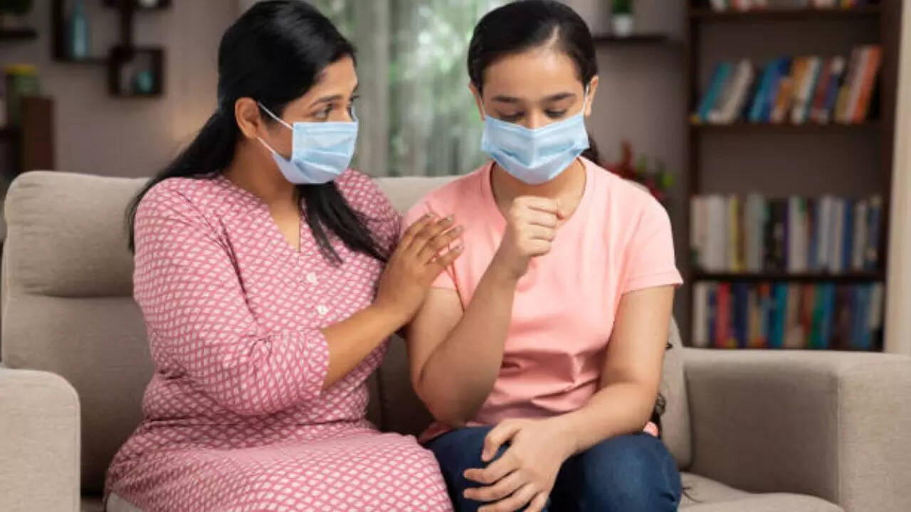 What are the symptoms of measles?