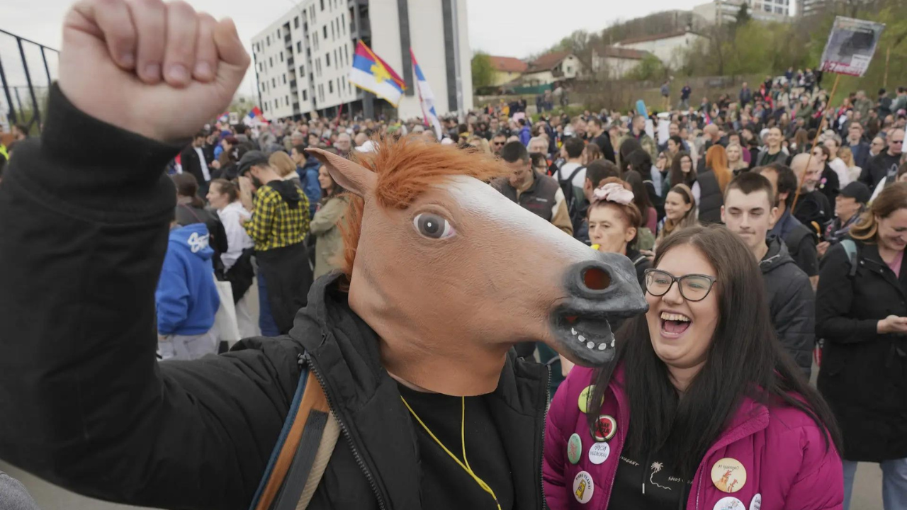 Protesting students in Serbia rally outside pro-government media outlet