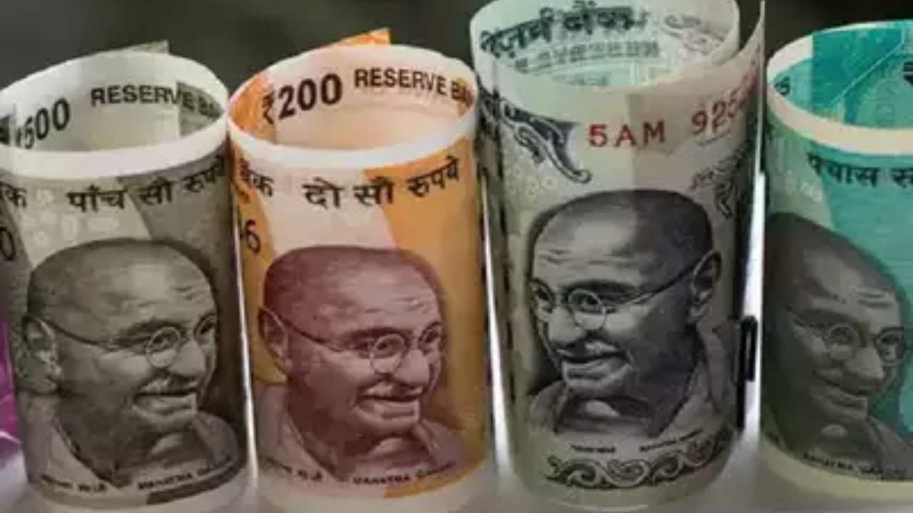 Rupee gains 64 paise to 86.04 as dollar loses globally
