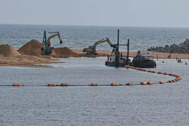 Finally, sandbar removal begins at Muthalapozhi