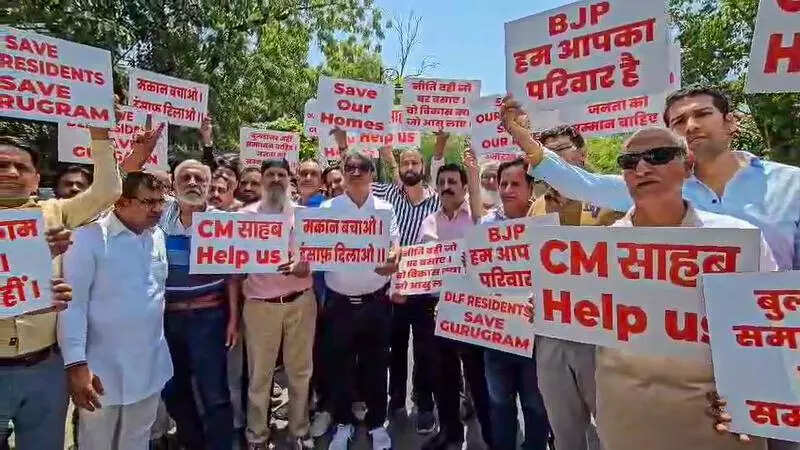 Homeowners in DLF areas protest against demolition orders, seek CM Saini’s help
