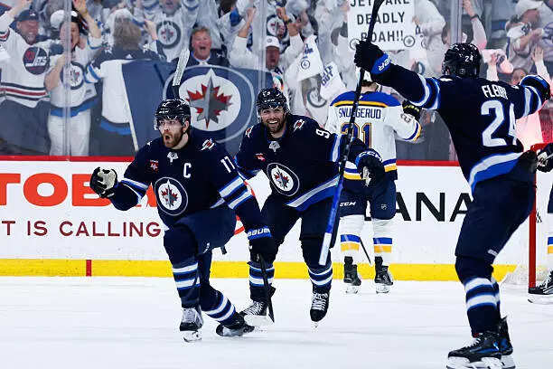 Winnipeg Jets celebrates after scoring a goal during the third period in Game Seven