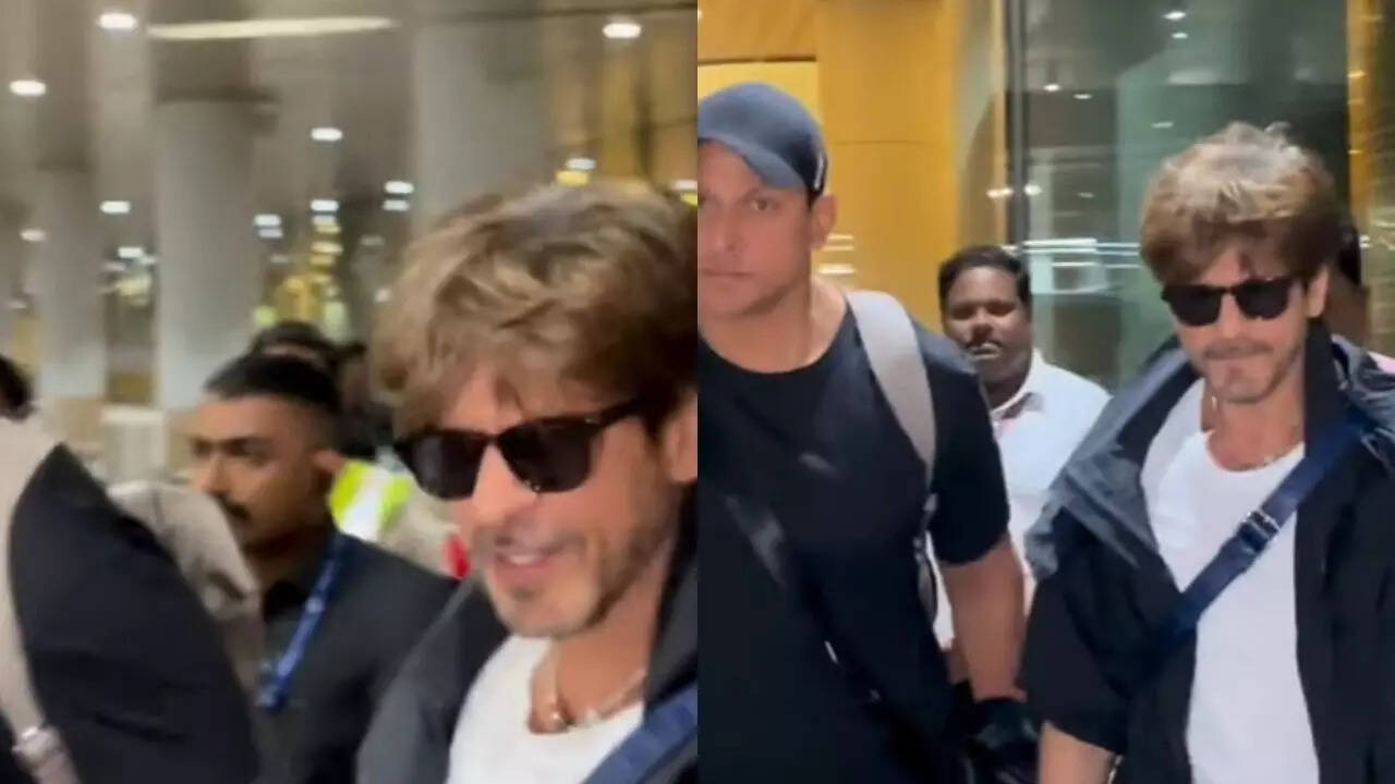 SRK smile at paps as he arrives Mumbai post Met Gala debut