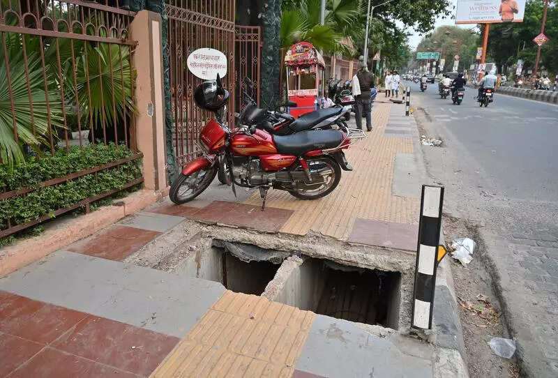 Injury, death beckon from open manholes in city