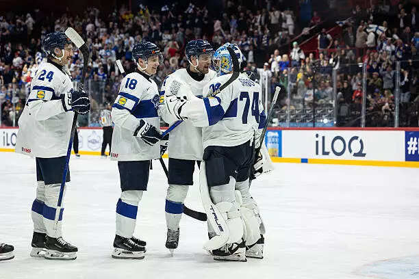 ​Finland celebrate after the 2025 Ice Hockey World Championship match between Canada and Finland