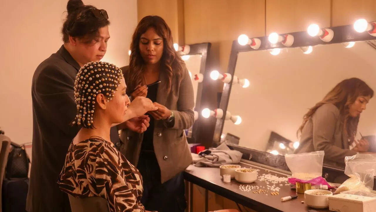 Sanea Sheikh gets ready for a fashion show finale