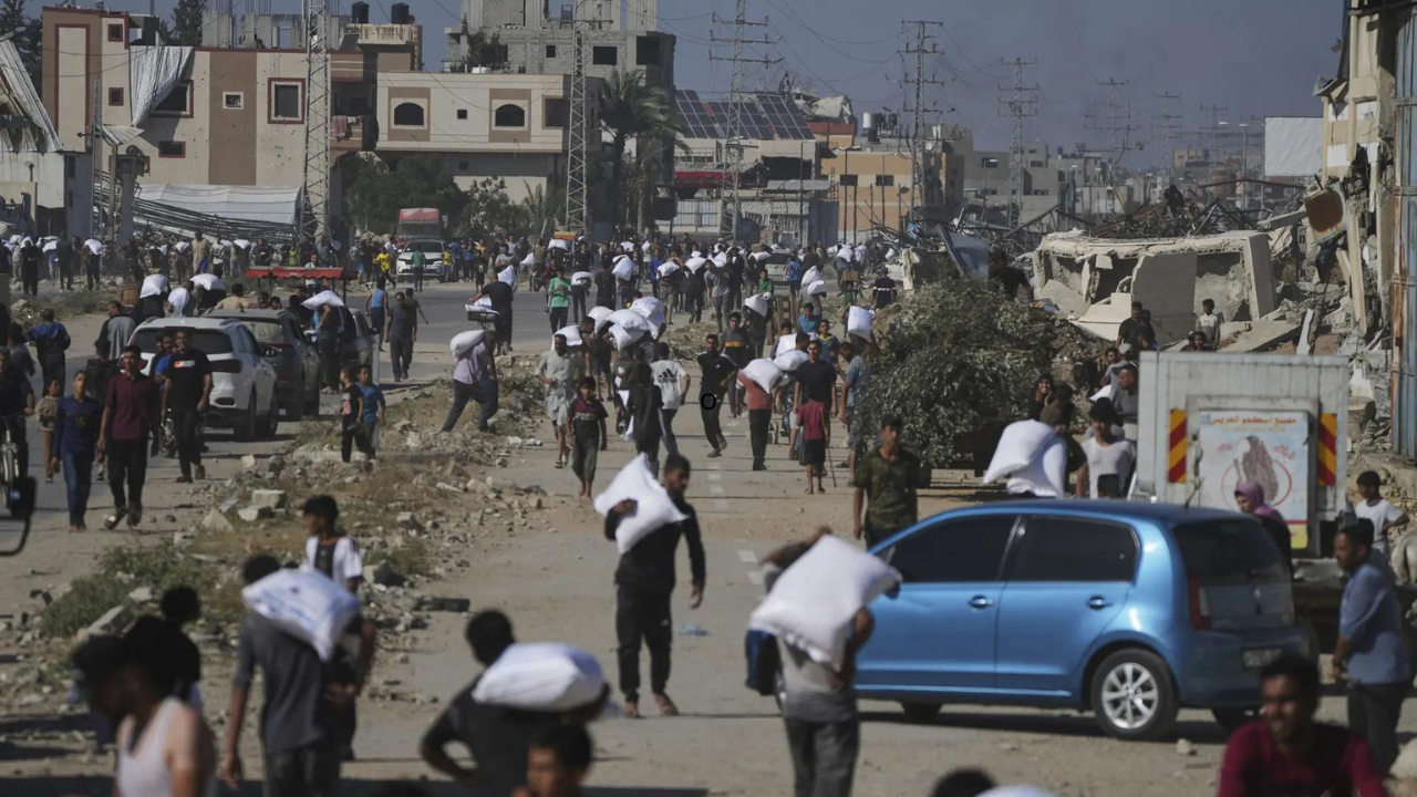Thousands storm aid warehouse in Gaza as hunger crisis deepens