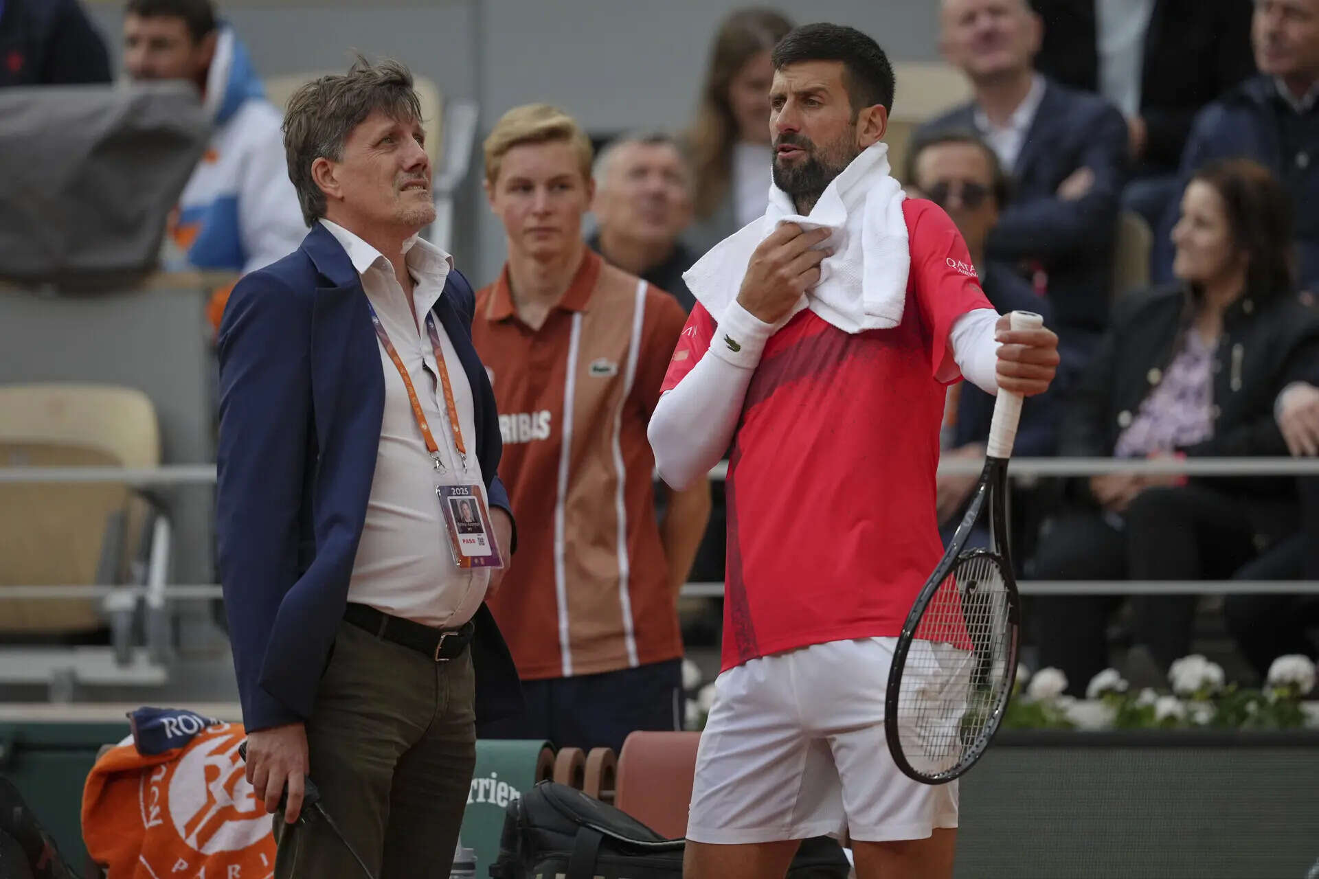 Novak Djokovic trades his racket for a bicycle and takes a nighttime ride around Paris