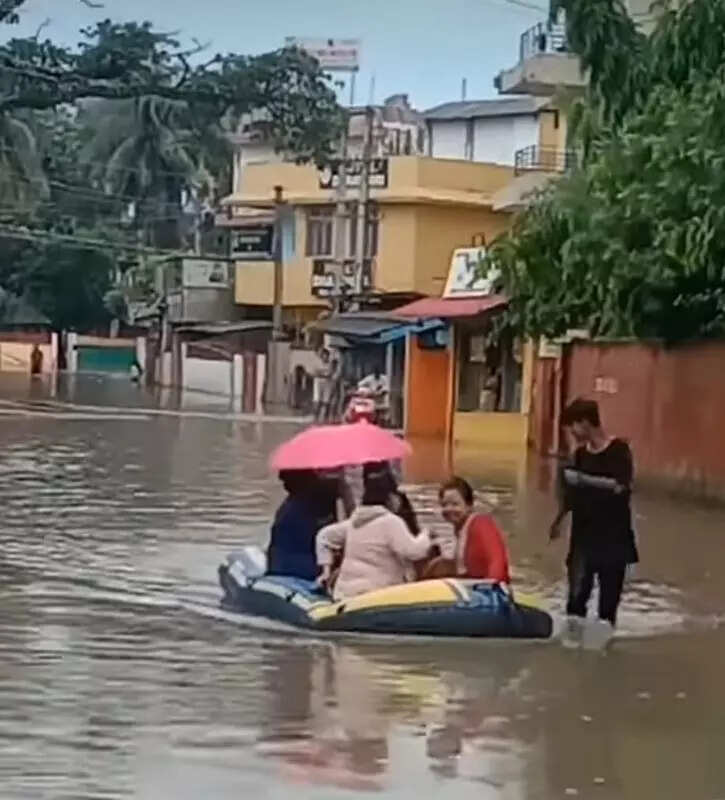 Residents buy rubber boats as rowing to school & work become new normal in Guwahati neighbourhood
