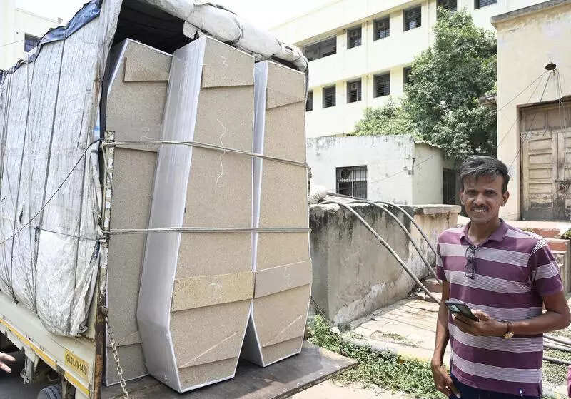 Coffin maker fulfils duty with quiet dignity after air crash