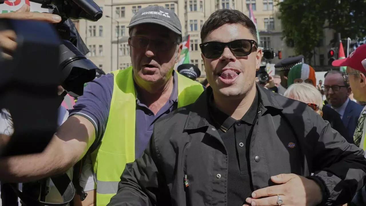 Irish group Kneecap appears in UK court; charged with terror offence over Hezbollah flag; hundreds rally in support outside courthouse