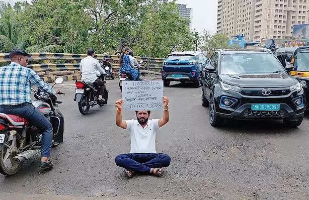 Potholes on Shahad flyover after repairs, locals protest