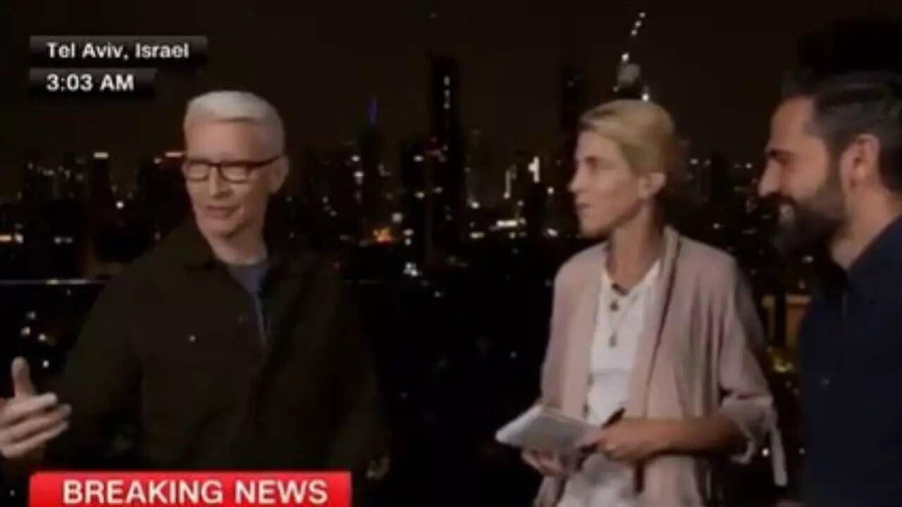 Watch: CNN's Anderson Cooper leaves Tel Aviv hotel studio amid missile alert