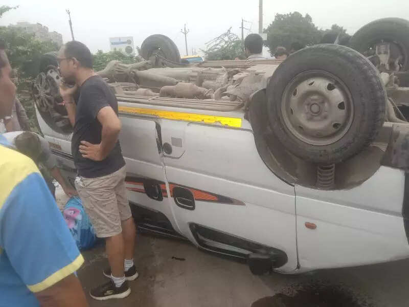 School van with 10 children overturns after being hit by speeding car