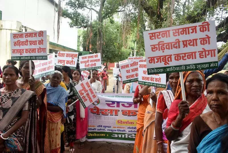 Tribals march to Raj Bhavan for implementation of Pesa Act in state