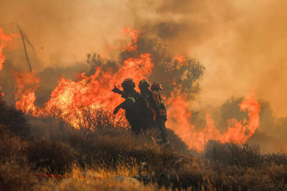 Forest fire near Athens under control, but area on high alert