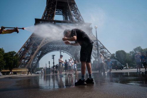 Europe bakes in summer's first heatwave as continent warms