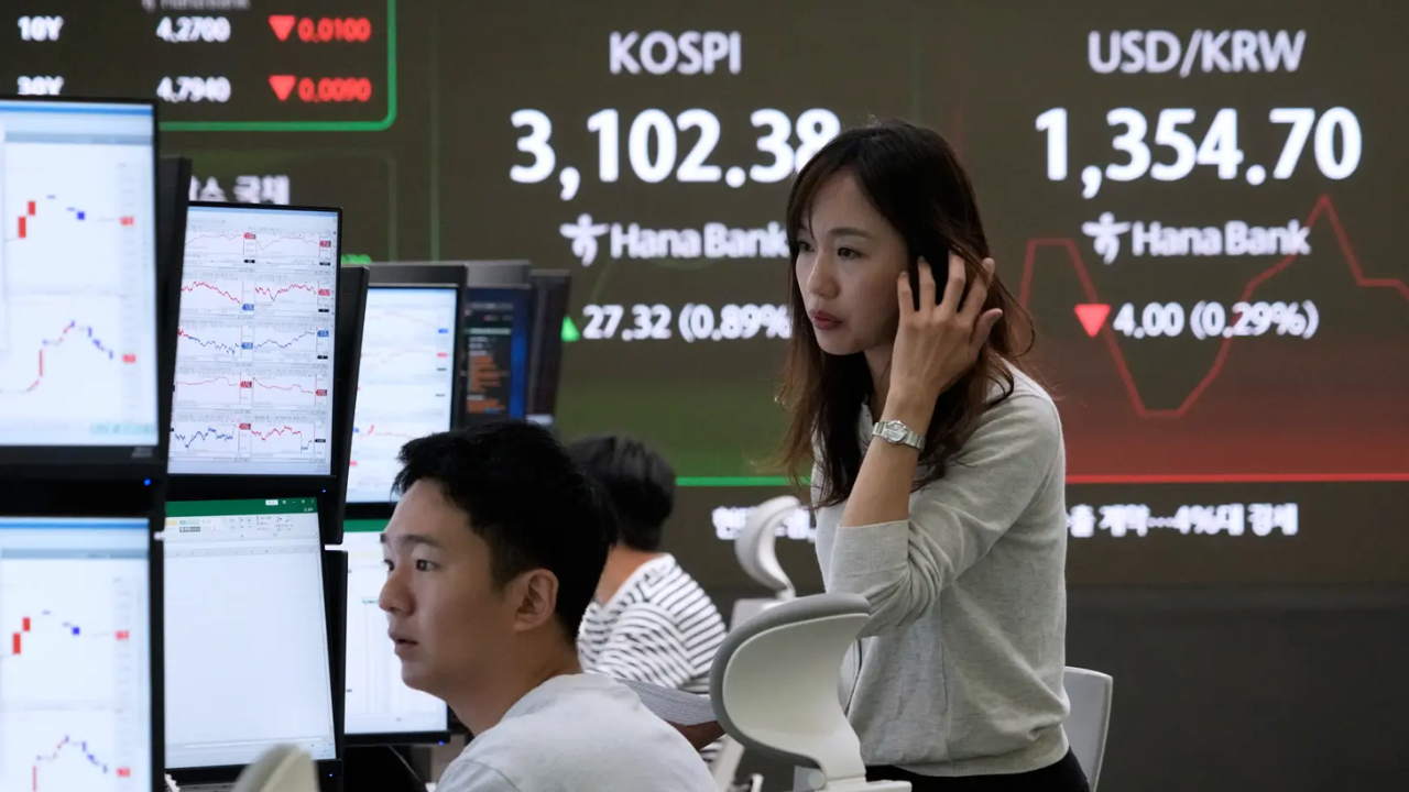 Asian equities mixed as Trump's tariff deadline looms; US jobs data surprises and Wall Street surges