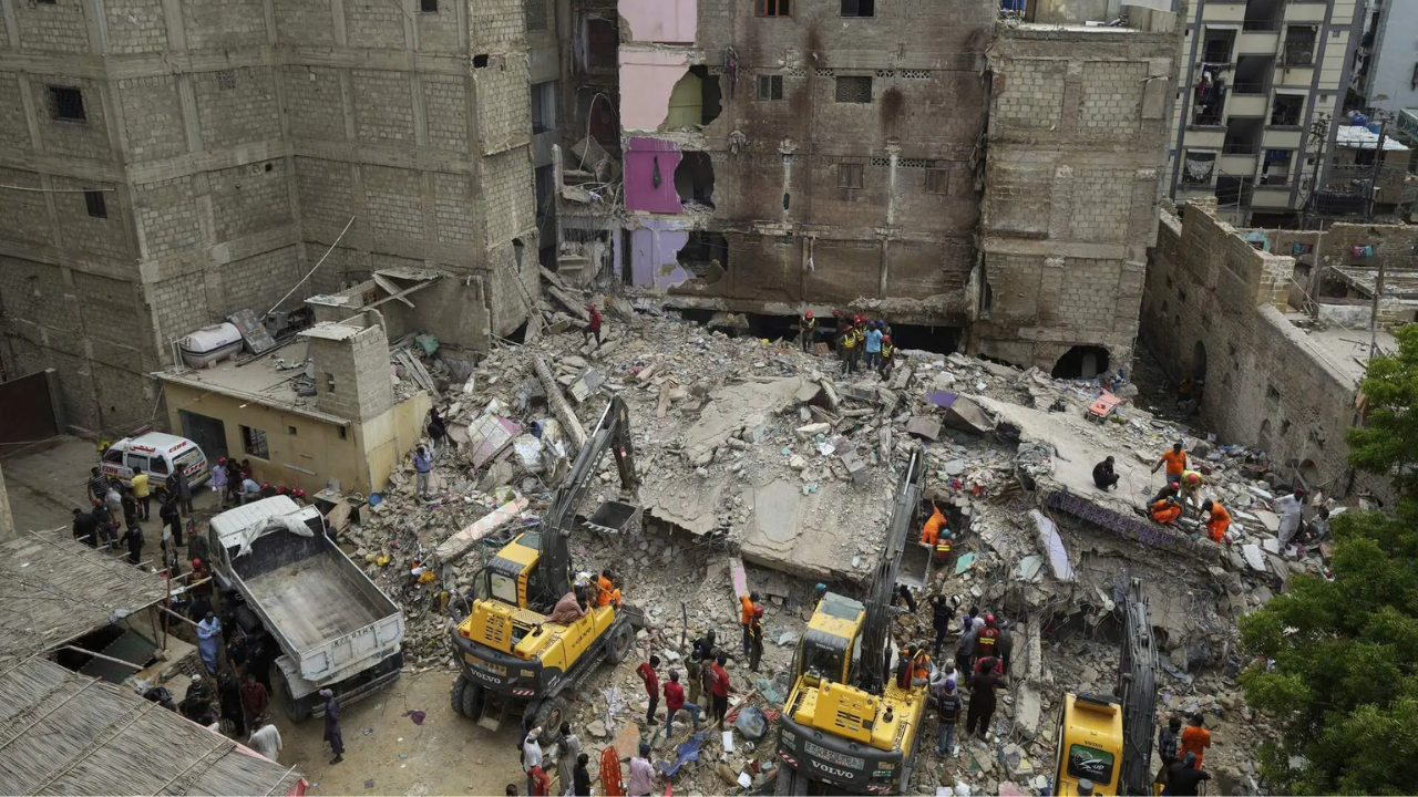 Pakistan building collapse: 16 dead, several feared trapped