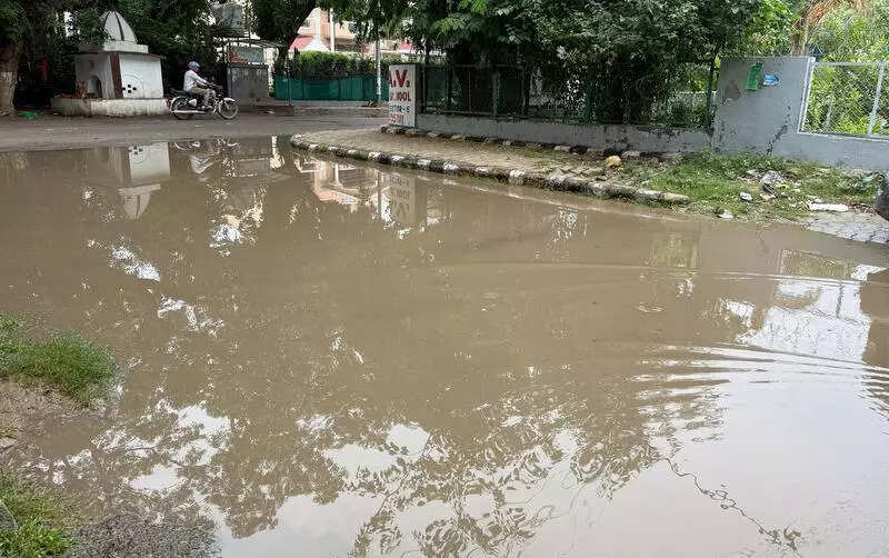 Cleaning lags, choked drains cause flooding on roads in Sector 5 after showers