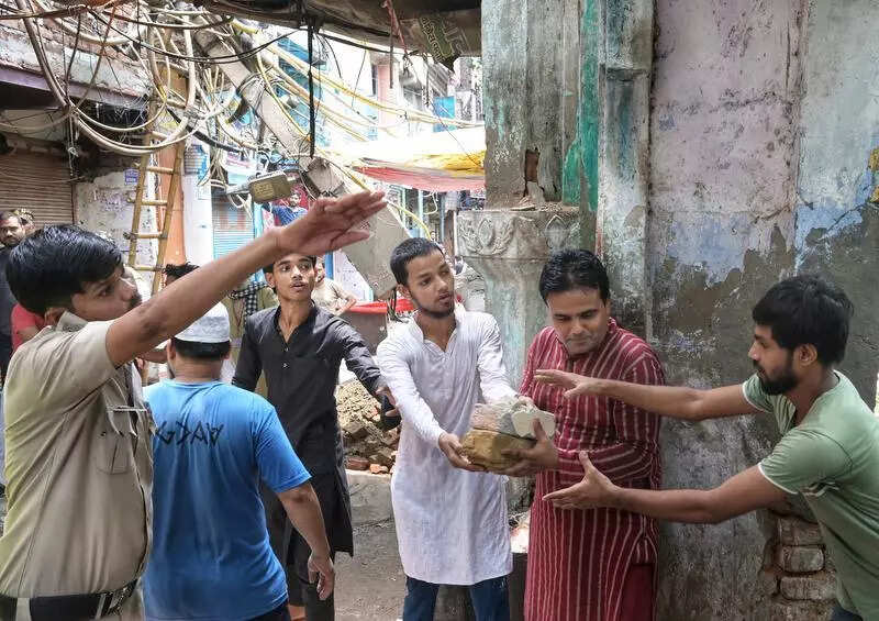 Lending a hand: Local heroes emerge amid chaos, clear debris for rescuers to reach site