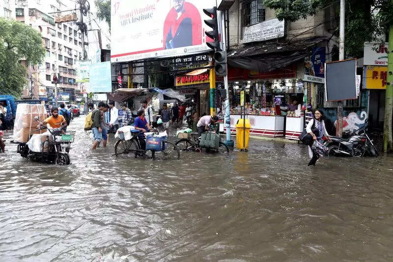 84 mm rain in less than 2 hours, high tide combine to sink city pockets