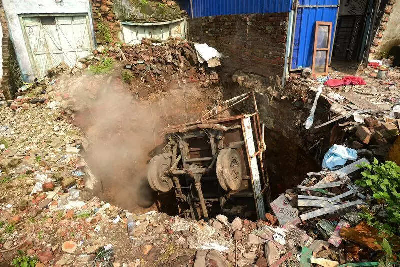 Pick-up truck buried as land caves in subsidence-hit Jharia