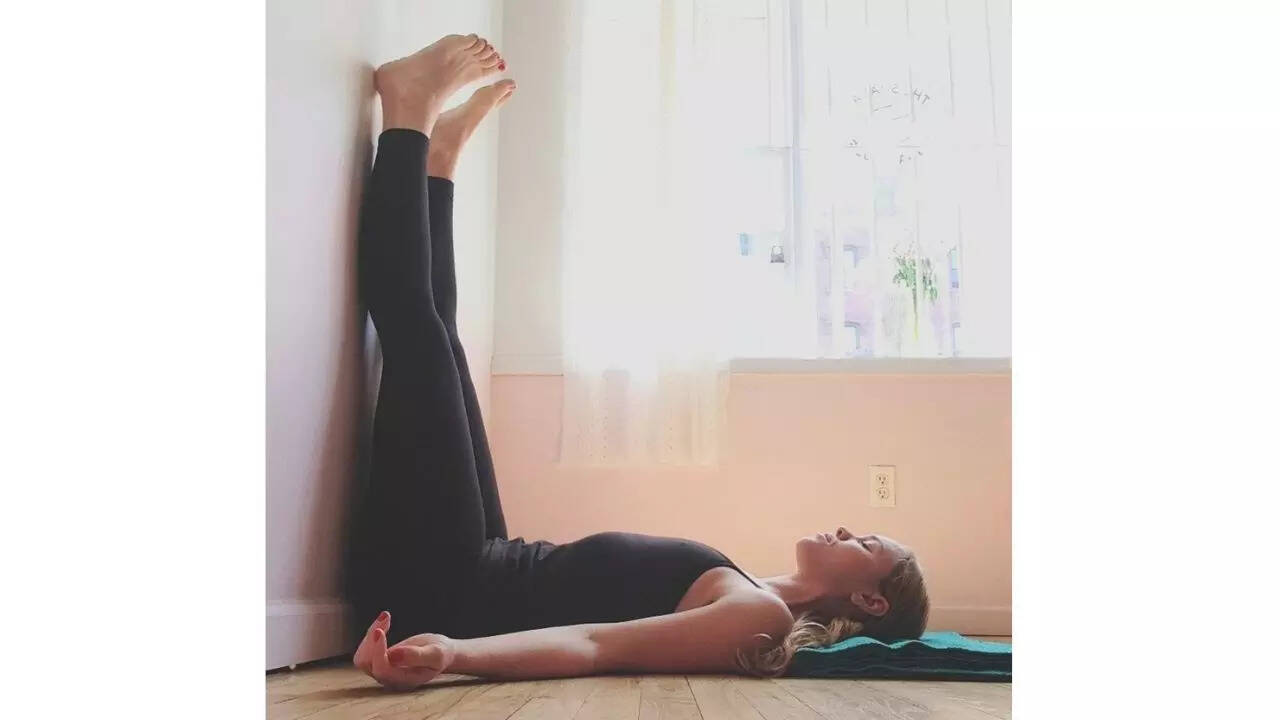 Viparita Karani (Legs-Up-the-Wall Pose):