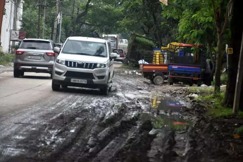 Choked drains, cratered roads plague Kokar biz hub