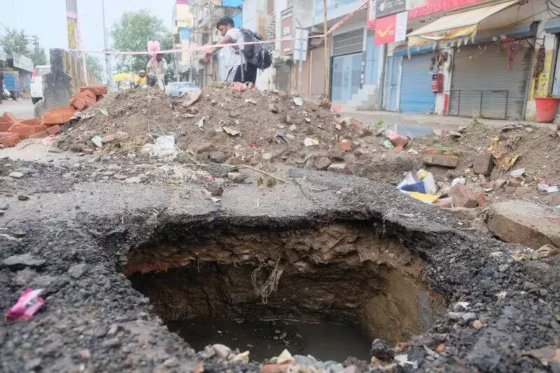 Infra crumbles under rain: 2 cave-ins on Basai Rd in 2 days