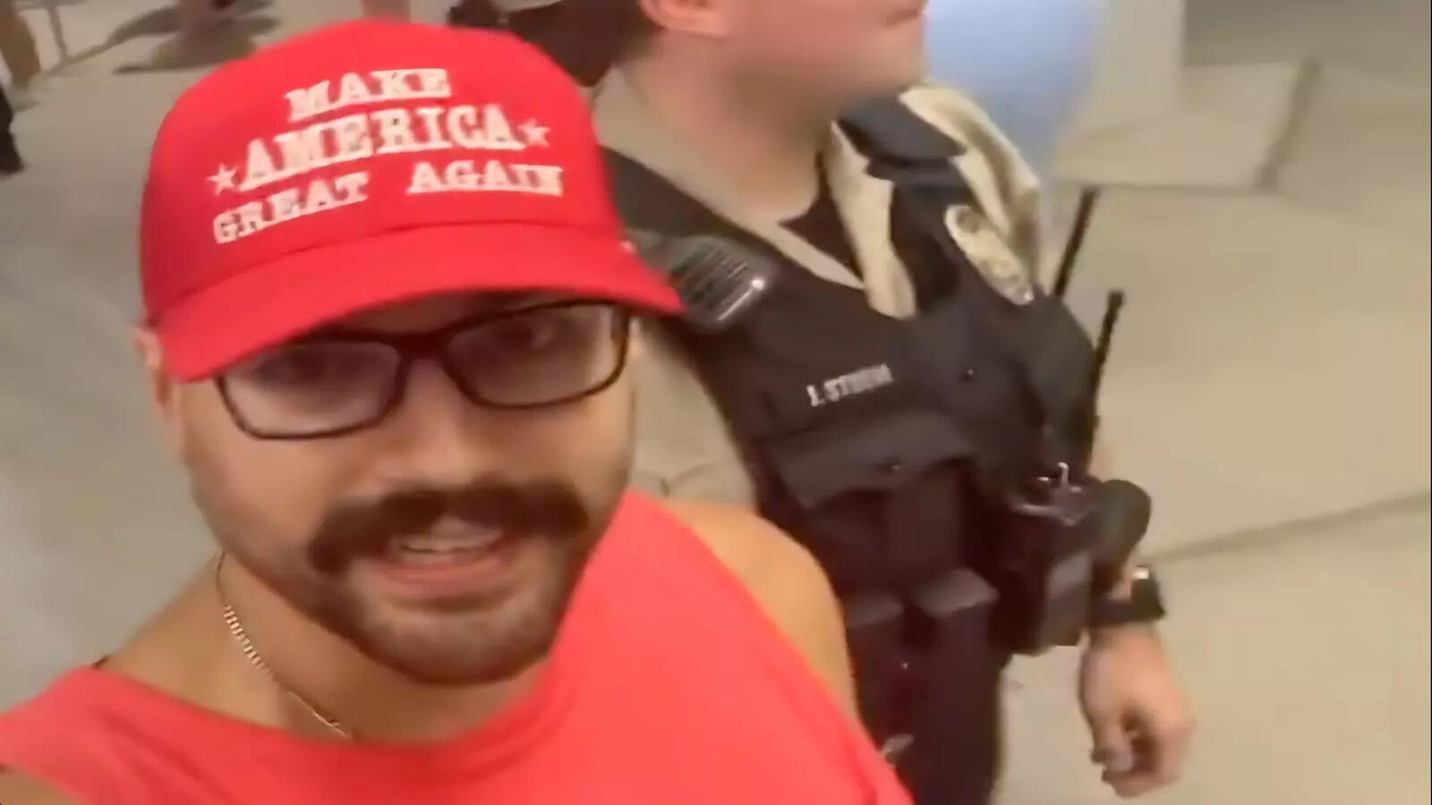 Trump supporter thrown out of St Louis stadium mid-game after refusing to remove MAGA hat