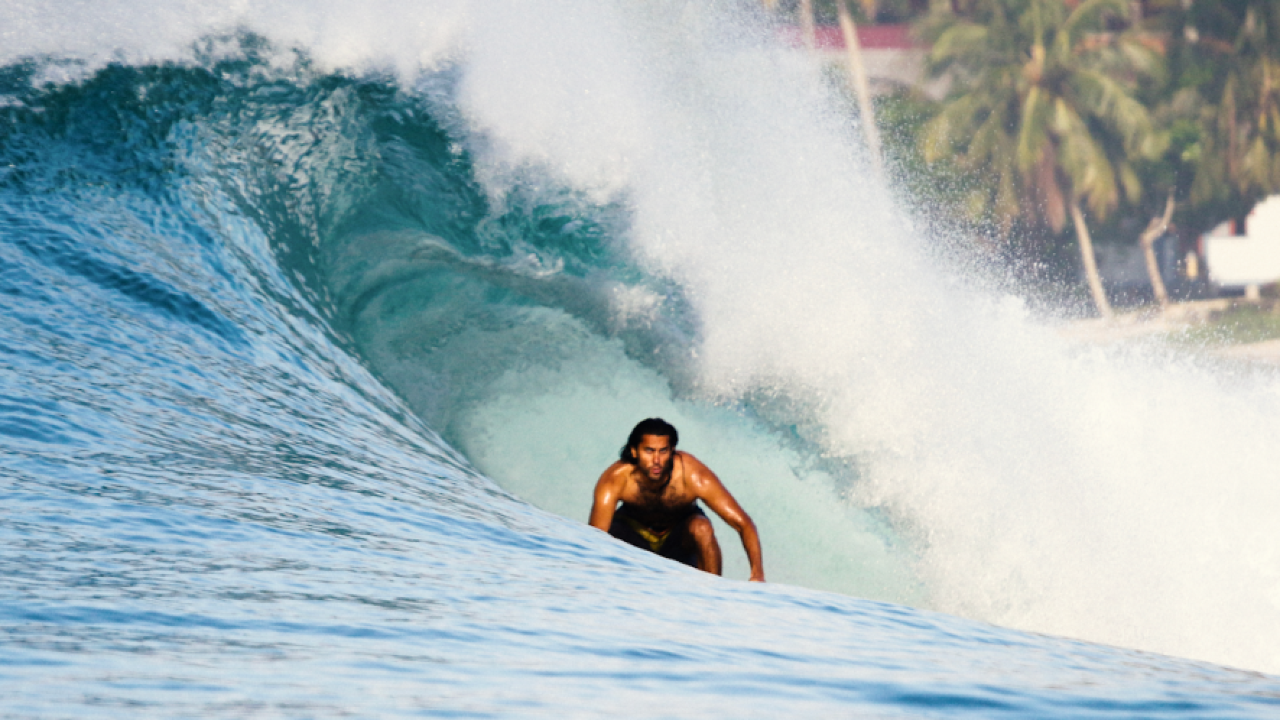 Away from ‘locked’ land, Afghan surfer rides wave of hope