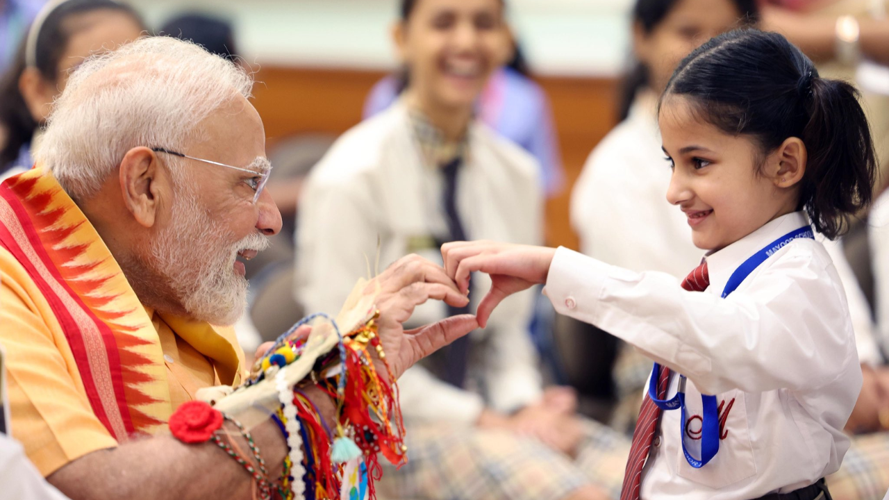 Raksha Bandhan with the PM: Modi shares cute moment with children; Brahma Kumaris join celebration – Pics