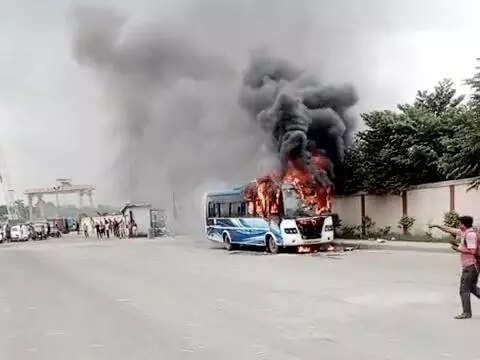 Bus catches fire near airport, 2 hurt in scramble to exit