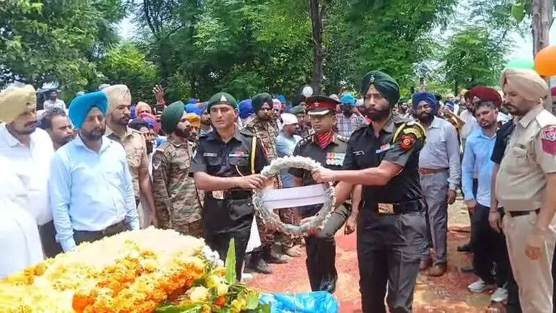 Manupur villagers, brothers-in-arms bid farewell to braveheart